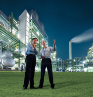 Two men in front of a facility in Shangai