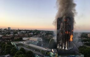 Grenfell Tower burning, pictured at 04:43 BST, 14 June 2017