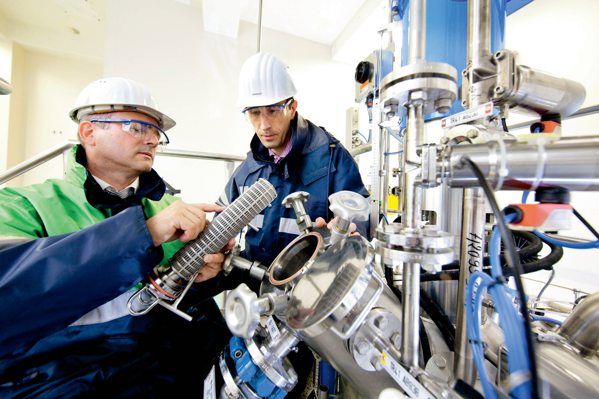 © Bayer Safety experts in a production plant
