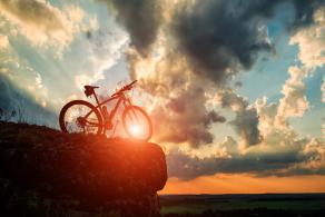 Beautiful scene of bike on sunset